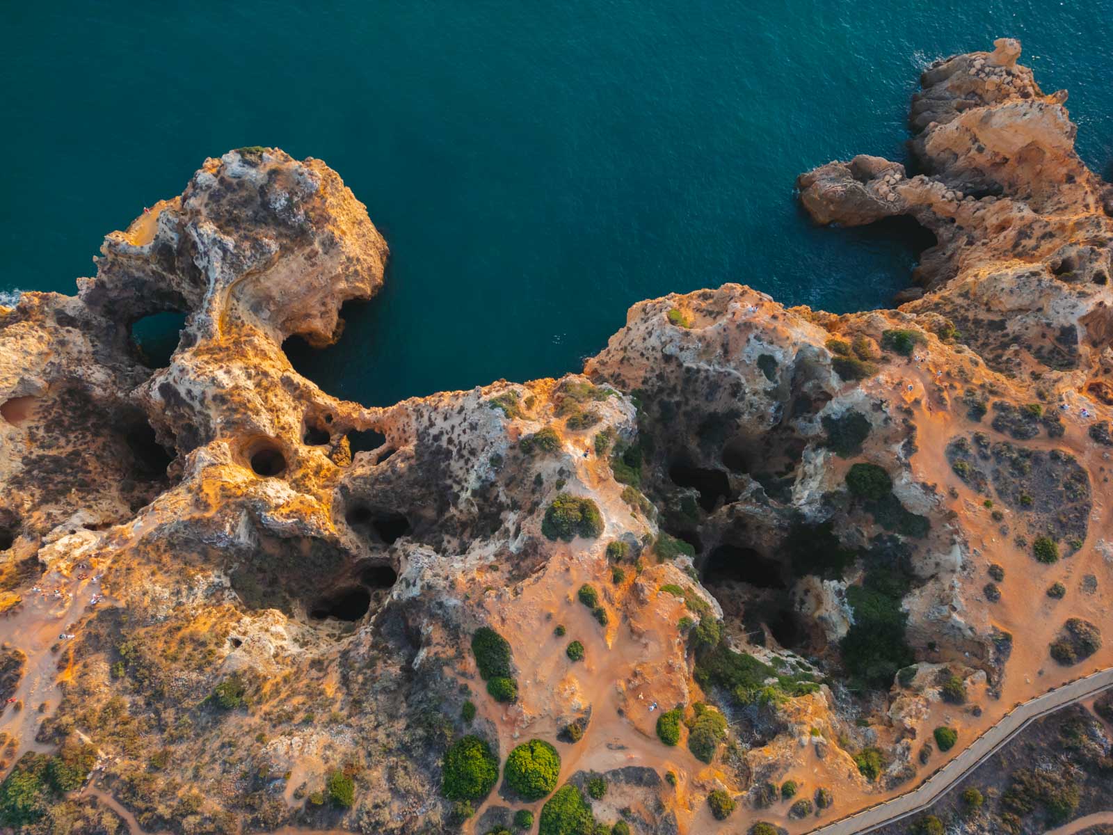 Lively marina scenes at the Praia da Marinha.